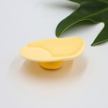 Load image into Gallery viewer, Silicone Facial scrubber Silicone Facial Scrubber Gently deep cleans face Can be paired with any cleanser light weight Easy to clean Suction grip on back Our durable flexible silicone facial scrubber will provide your face a deep yet gentle cleanse. Its surface pattern helps to quickly lather any facial cleanser you use. Its convenient suction grip on back allows you to stick it to any table or wall.
