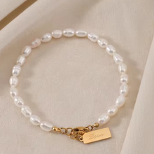 Load image into Gallery viewer, Waterproof gold pearl bracelet made from tarnish-resistant stainless steel by Dark Suga.
