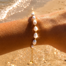 Load and play video in Gallery viewer, Waterproof gold pearl necklace adjustable made from tarnish-resistant stainless steel by Dark Suga.

