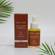 Load image into Gallery viewer, Post Sugaring Waxing Calming Oil. Instantly soothes and calms inflamed skin 100% natural ingredients Enriched with vitamin E to deeply moisturize skin Boosts collagen production Helps protect skin against sun damage Reduces, skin redness. Multi use body and face oil
